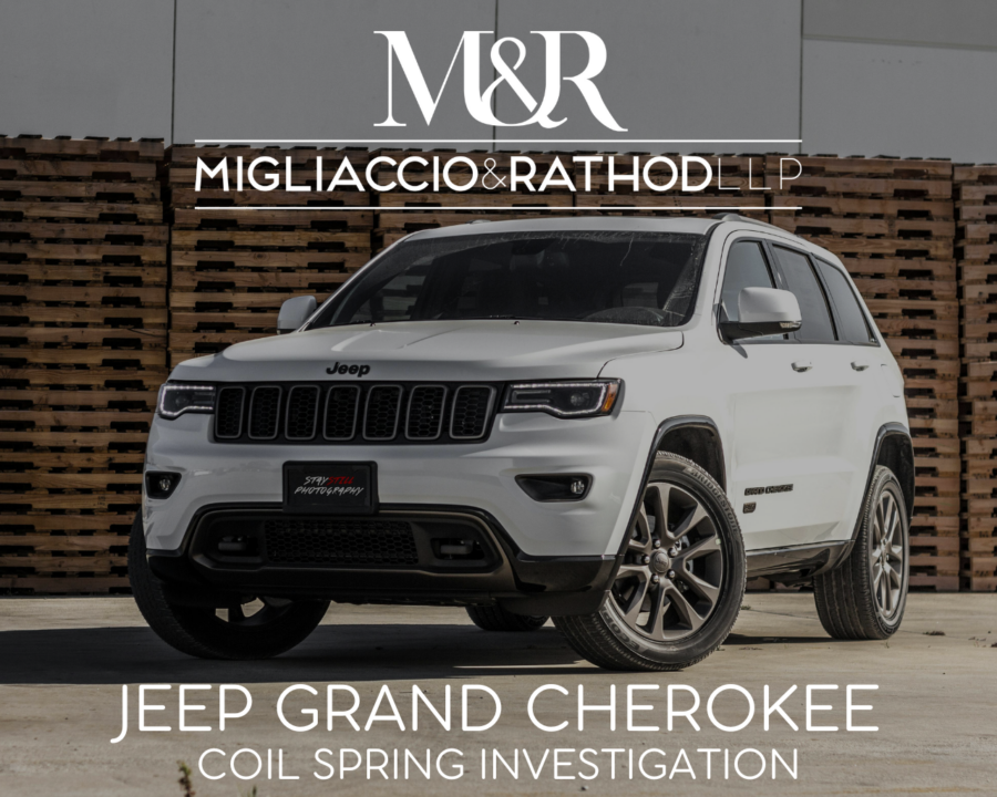 Graphic announcing the Jeep Grand Cherokee Coil Spring Investigation, featuring the Migliaccio & Rathod LLP logo and a background image of a Jeep Grand Cherokee.