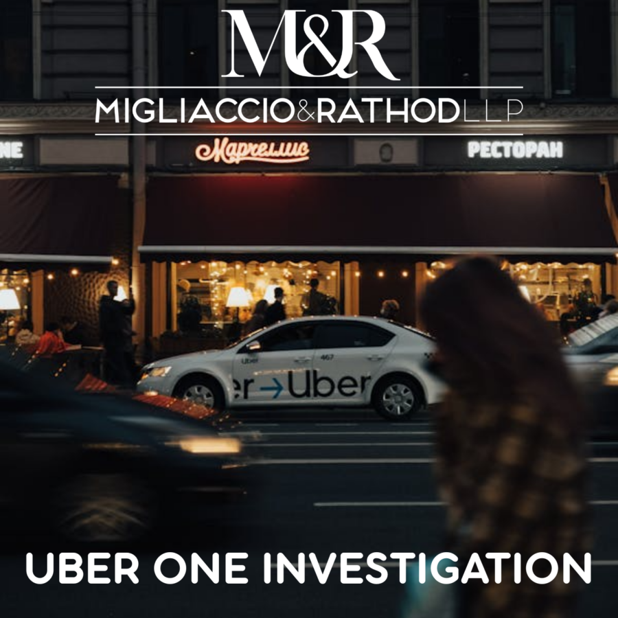 Image of a white Uber vehicle with the Migliaccio & Rathod LLP logo