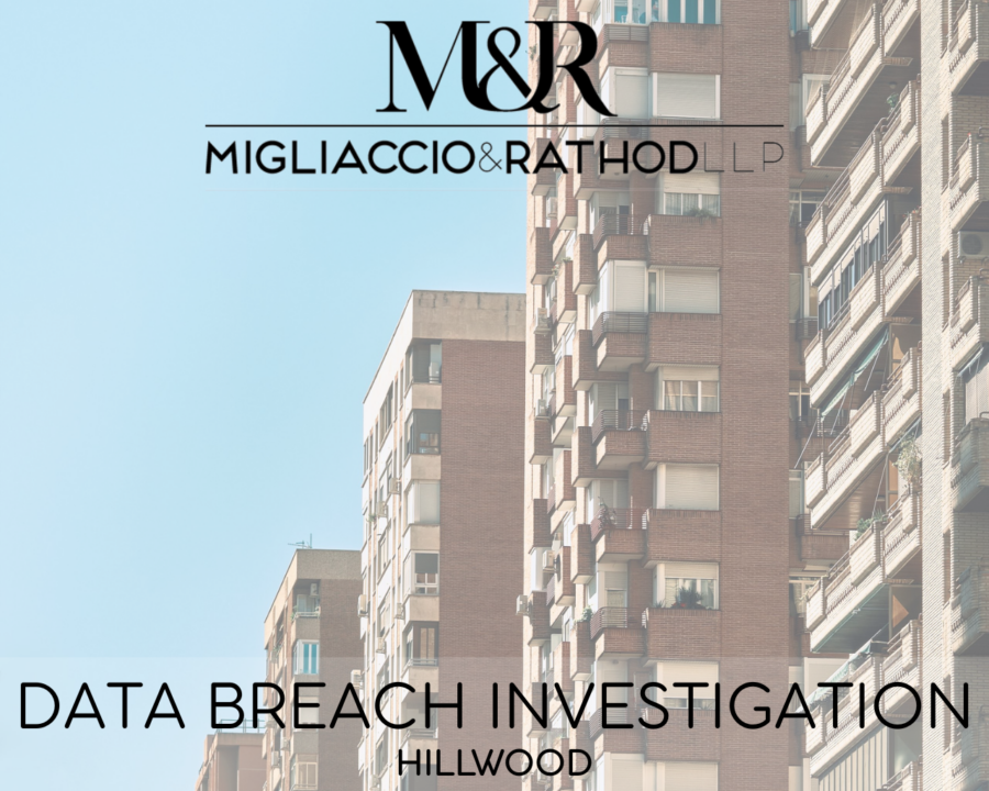 Graphic announcing the Hillwood data breach investigation featuring the Migliaccio & Rathod LLP logo and a background image of apartment buildings.